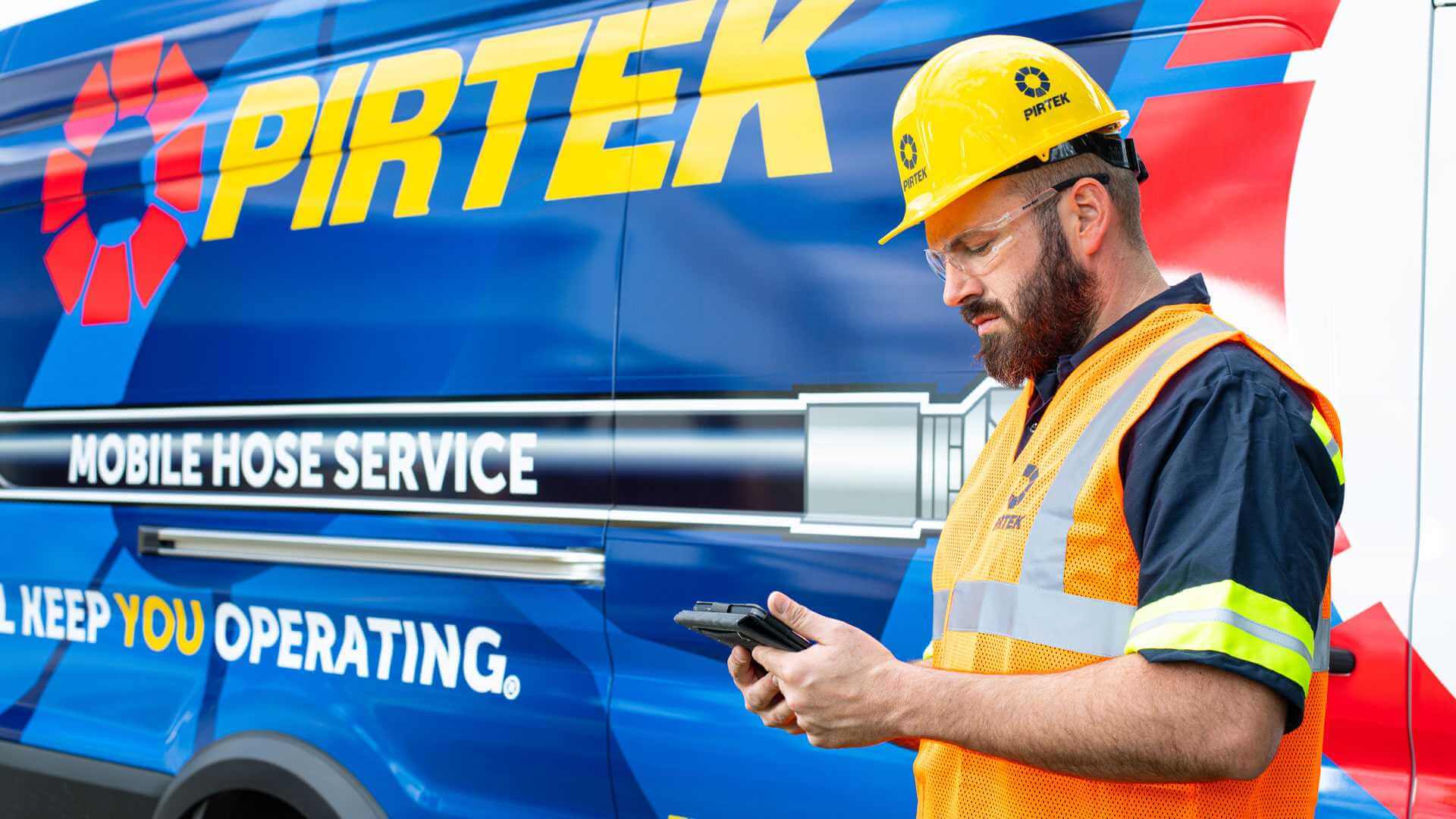 Visualize the Power of PIRTEK Truck, a Symbol of Reliability and Efficiency in Hydraulic Hose Replacement.